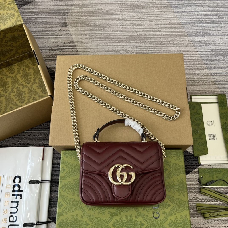 G*u*i top handle bags